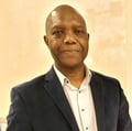 Dr. Mukwel Aiyuk