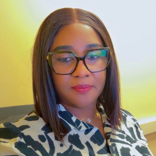 Headshot of Oludolapo Alebiosu, APRN