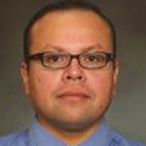 Headshot of Carlos Aquino, LCPC