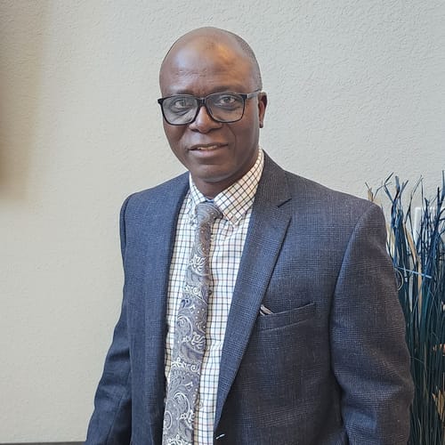 Headshot of Rauf Emiola, APN