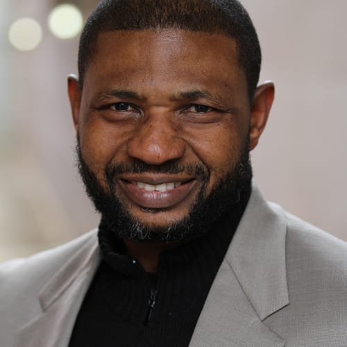 Headshot of Lewis Kola, LPC