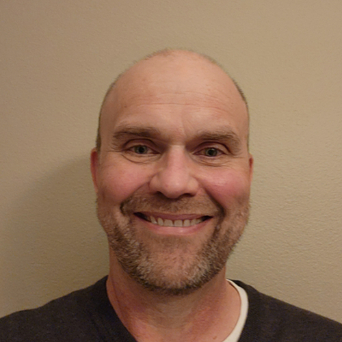 Headshot of Evan Landvik, LCSW