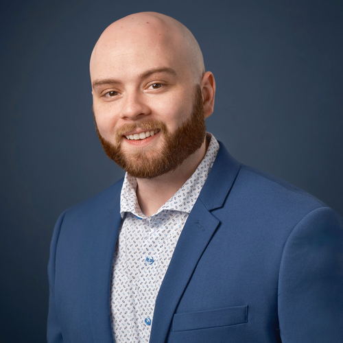 Headshot of Caleb Hoover, LMHC