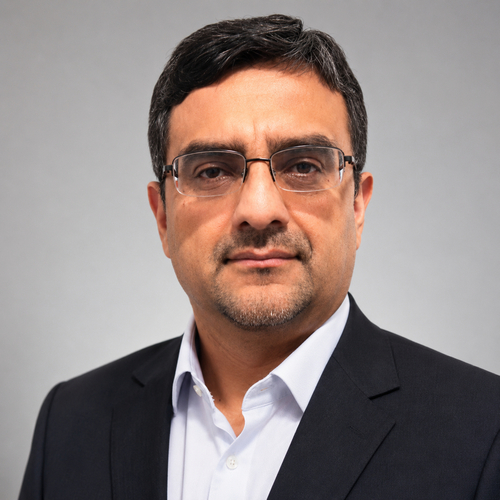 Headshot of Carlos Coloma, APRN