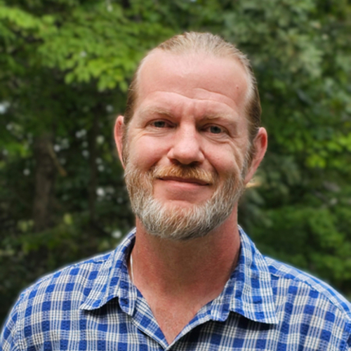 Headshot of Kevin Asmann, LPC