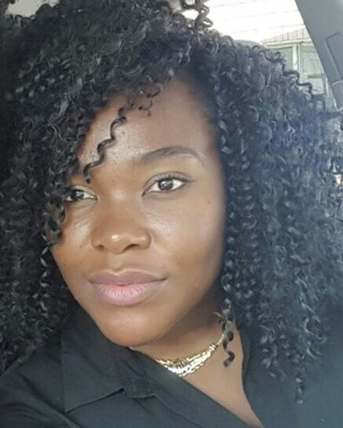Headshot of Elli Assiobo-Tipoh, LPC