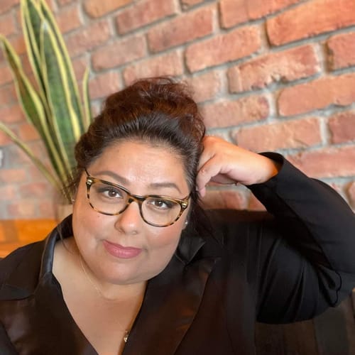 Headshot of Elia Guzman, LPC