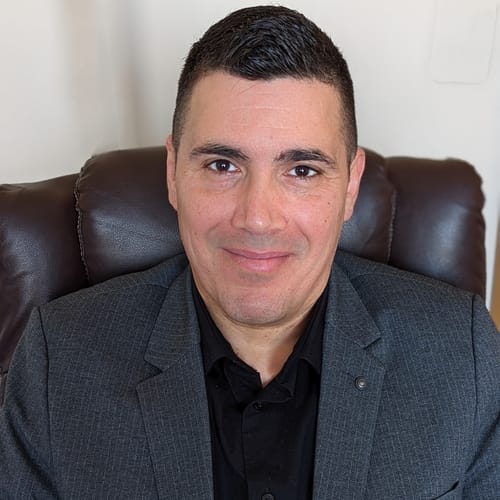 Headshot of Christopher Scropos, LCPC