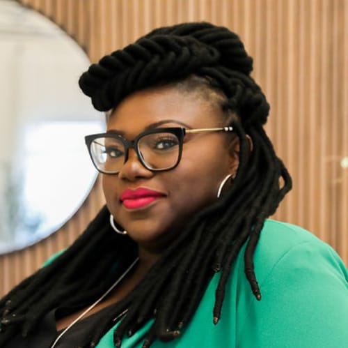 Headshot of Busola Adegunwa, LPC