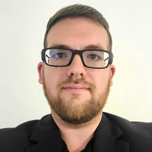 Headshot of Gino Rubens, LMHC