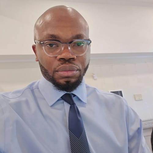 Headshot of Chibuike Enyinnia, APN