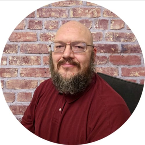 Headshot of Brett Dustin, LCSW