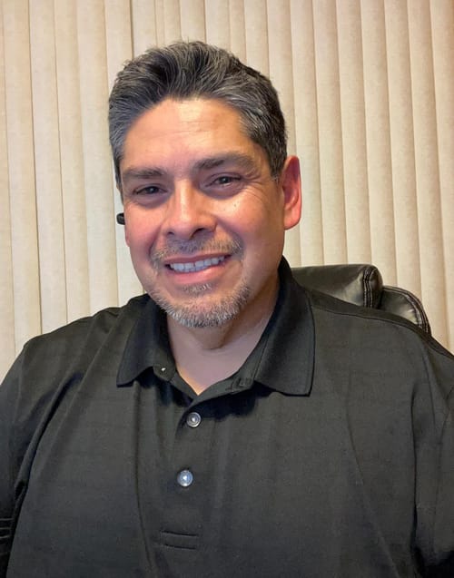 Headshot of Leo Merino, LPC