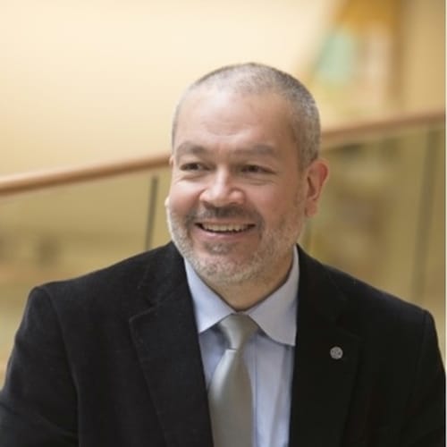 Headshot of Carlos Del Rio, LIMHP