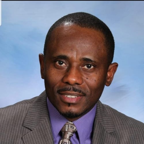 Headshot of Martins Akhibi, NP