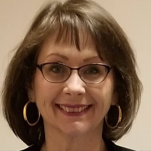 Headshot of Noel Dianas-Hughes, LCSW