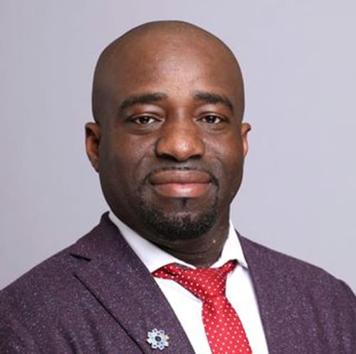 Headshot of Gordon Kusi, APN