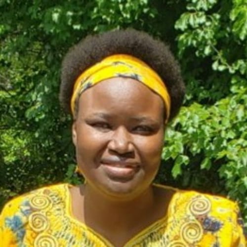 Headshot of Consolata Omingo, APRN