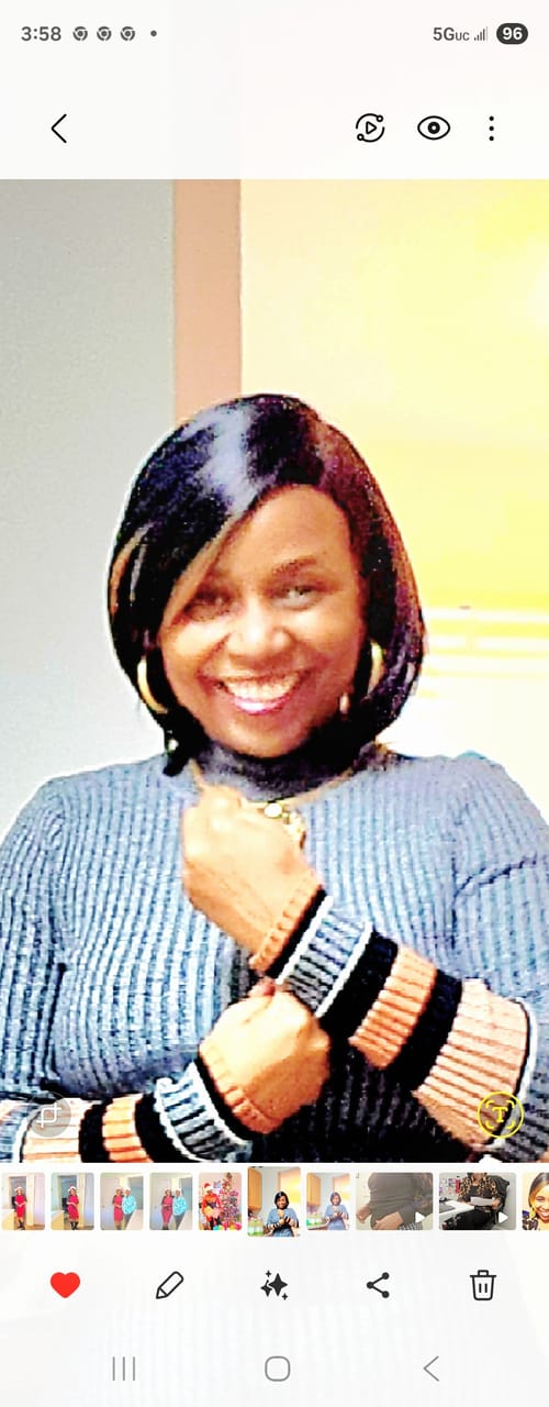 Headshot of Julie Mutua, NP