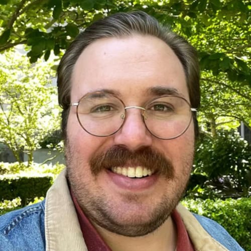 Headshot of John Michael Jennings, LMHC