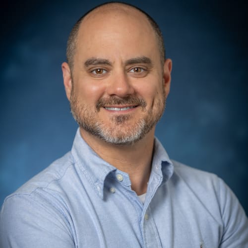 Headshot of Evan Swink, LCSW