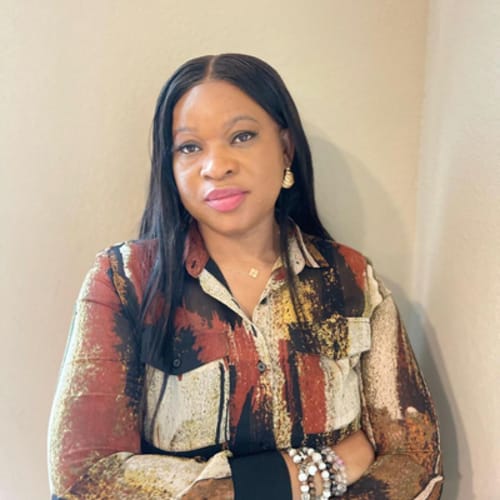 Headshot of Ejemenare Daudu, APRN_CNP