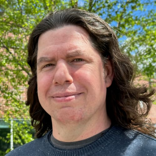 Headshot of Jason Mishoe, APRN
