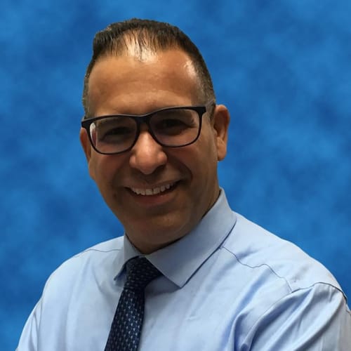 Headshot of Marcelino Guillen, LCSW
