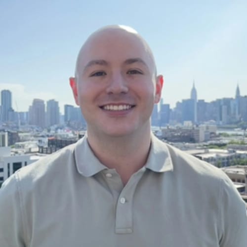 Headshot of Luciano Escobar, LMHC