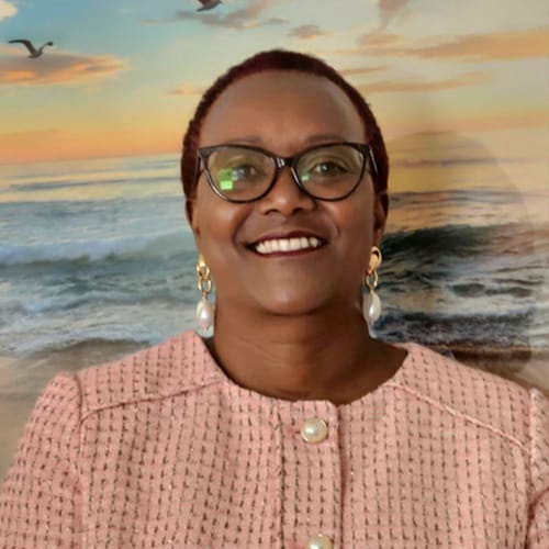 Headshot of Esther Migongo, APN