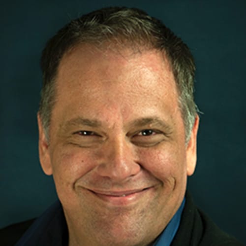 Headshot of Eric Delker, LMHC
