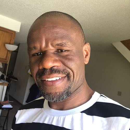 Headshot of Kizito Wenani, APRN