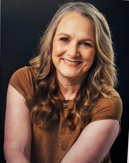 Headshot of Stephanie McIntosh Szabo, LMHC