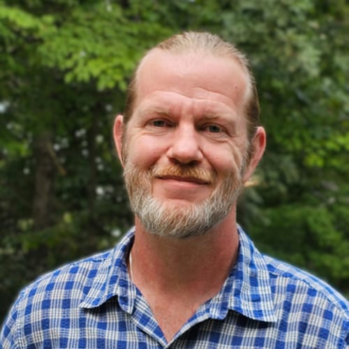 Headshot of Kevin Asmann, LPC