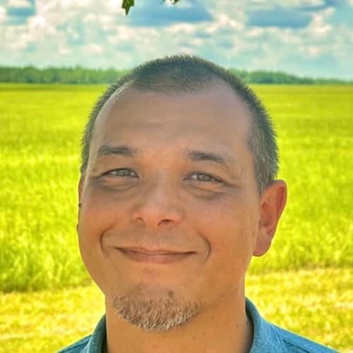 Headshot of Alan Okamoto, LMFT