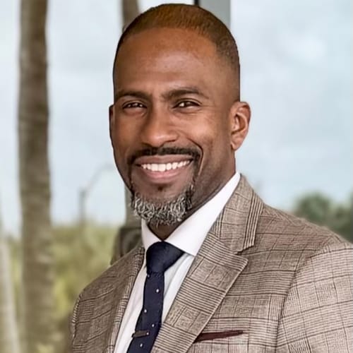 Headshot of Reginald Perard, APRN