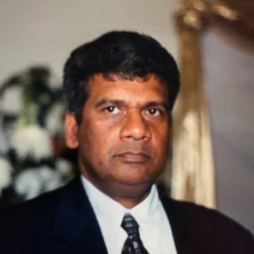Headshot of Nainan Thomas, LICSW