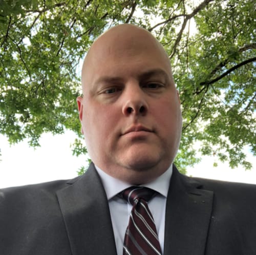 Headshot of Christopher Sharpe, APRN