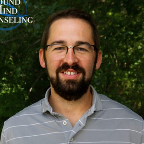 Headshot of Taylor Bell, LPCMHSP