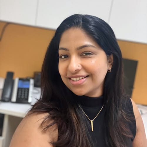 Headshot of Dinumol Mathew, CRNP