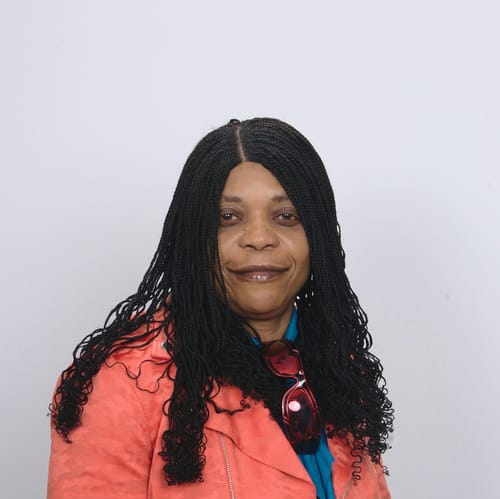 Headshot of Faustina Adenuga, APRN