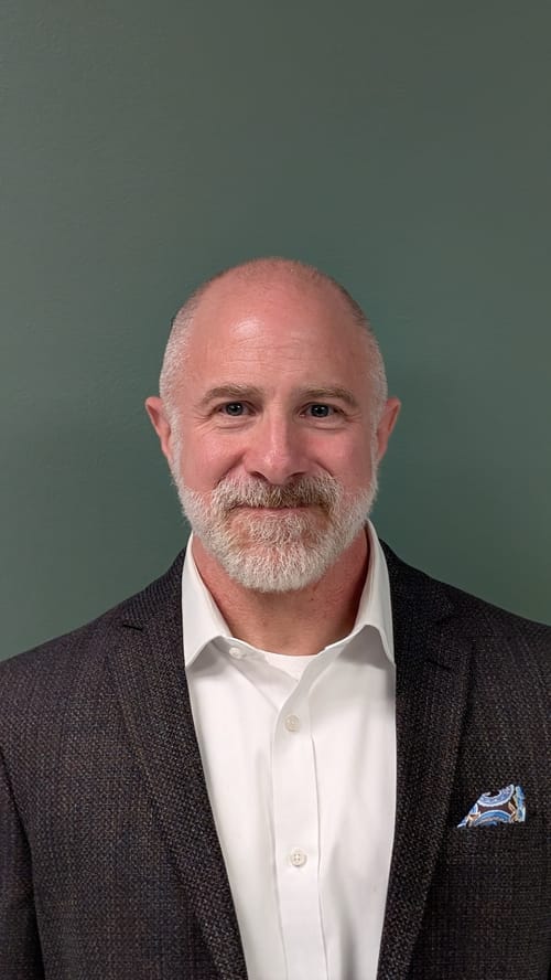 Headshot of Michael Tolloti, LMFT