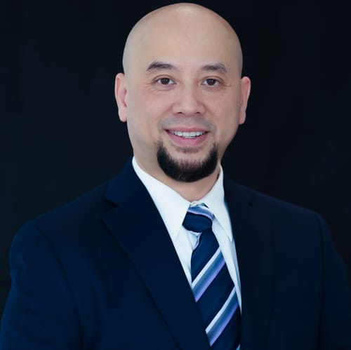 Headshot of Paul Dang, APRN