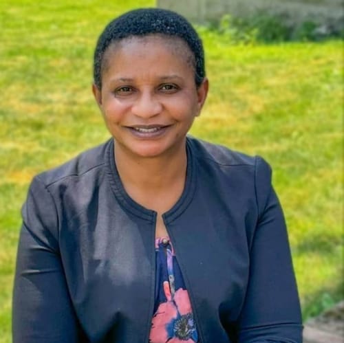 Headshot of Divine Ezewuzie, APRN
