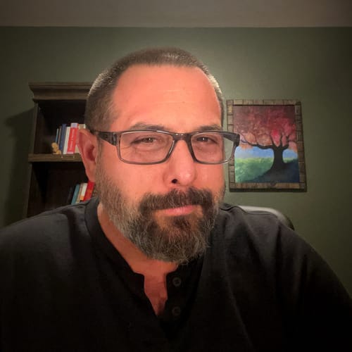 Headshot of George Calasa, LPCC