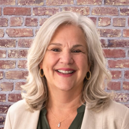 Headshot of Kelly Huey, LCSW