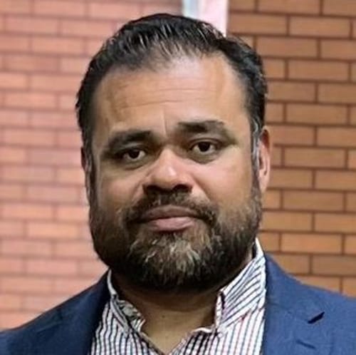 Headshot of Oscar Aguilera, LPC