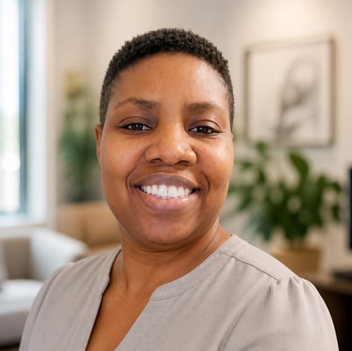 Headshot of Joan Ajide, APRN