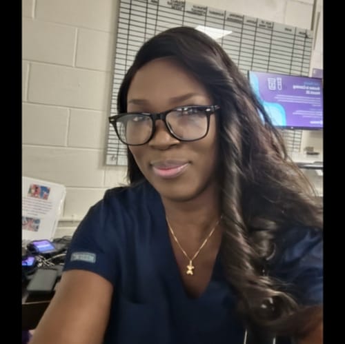 Headshot of Lucia Adebesin, APRN