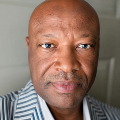 Headshot of George Gikera, APRN
